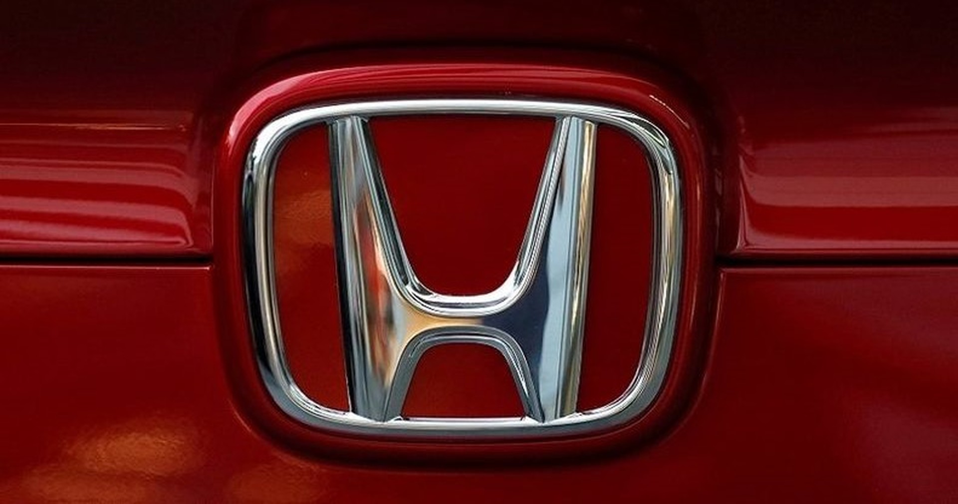 Autofile News Honda Slashes Output