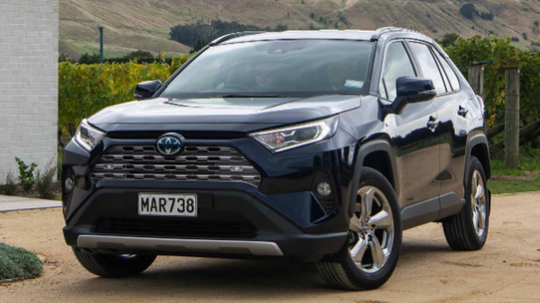 Toyota hails hybrid sales for cutting emissions