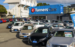 Turners lifts profit guidance