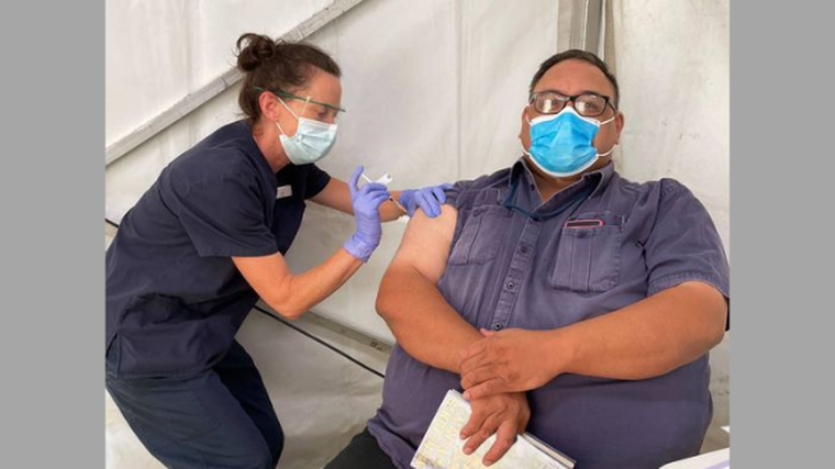 Port workers receive Covid-19 vaccines