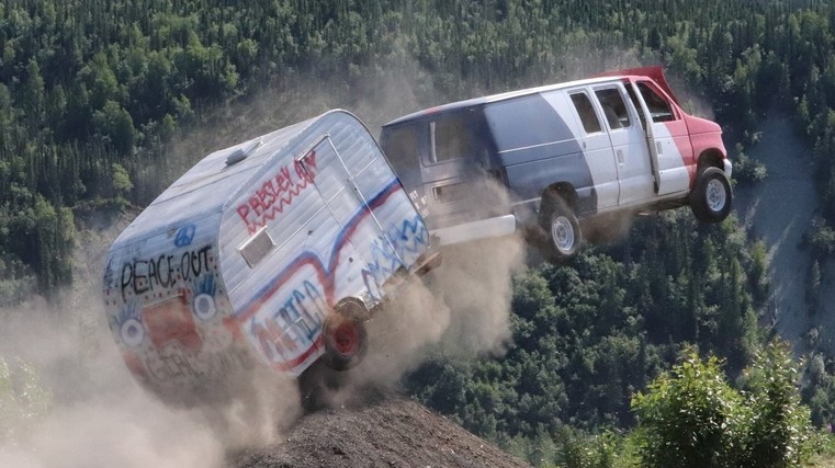 Celebration flings cars off cliff