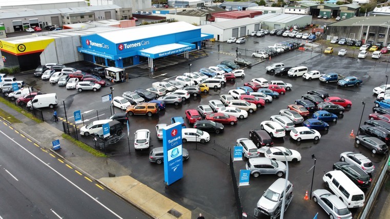 Turners seals record half-year profit