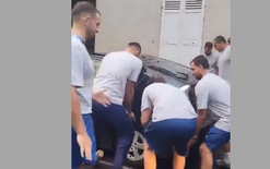 Olympians grapple with parked car