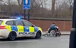 Woman in wheelchair evades cop car