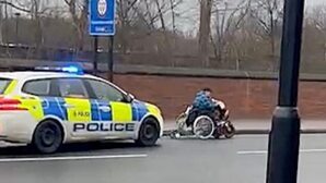 Woman in wheelchair evades cop car