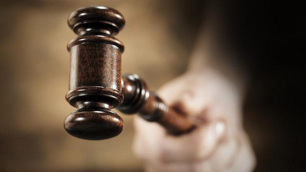 Banned trader cops fine