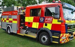 Blaze hits car yard