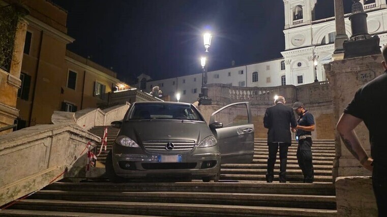 Luxury car stuck on landmark